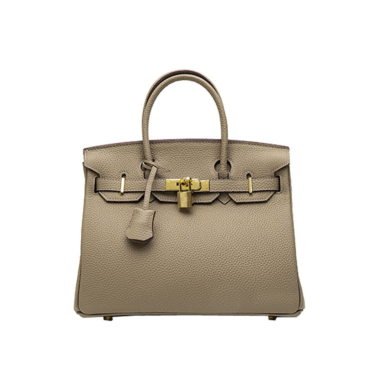 2025 H home platinum bag lychee pattern leather bag women's new first-layer cowhide fashion portable New Year's wedding bag