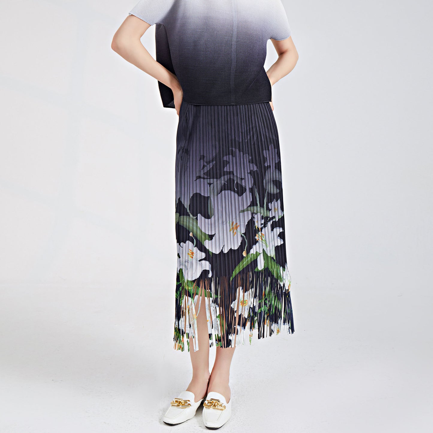 Shenzhen Nanyou high-end women's clothing fringed skirt spring women's skirt printed elastic waist Sanzhai one-step hip wrap skirt