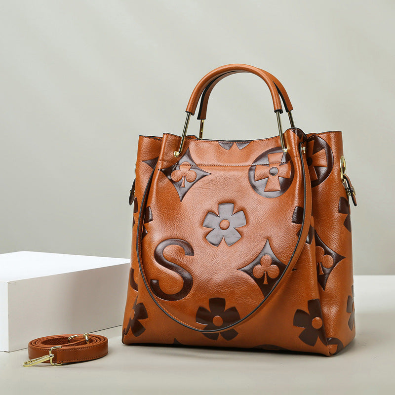 2025 Bucket bag, high-end large-capacity handbag, retro temperament commuter bag, simple printed women's portable tote bag
