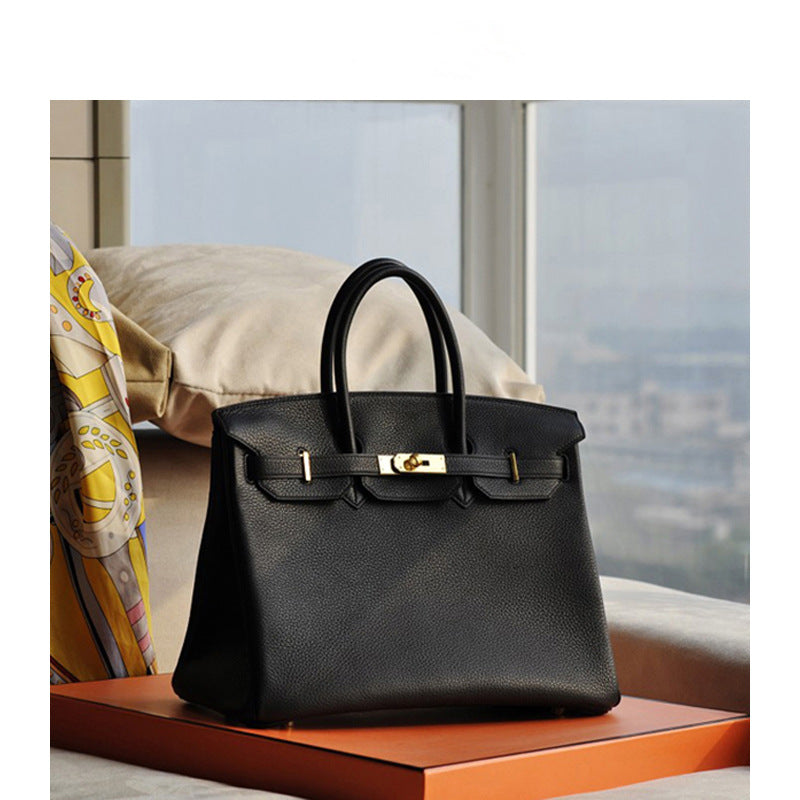 2025 H home platinum bag lychee pattern leather bag women's new first-layer cowhide fashion portable New Year's wedding bag