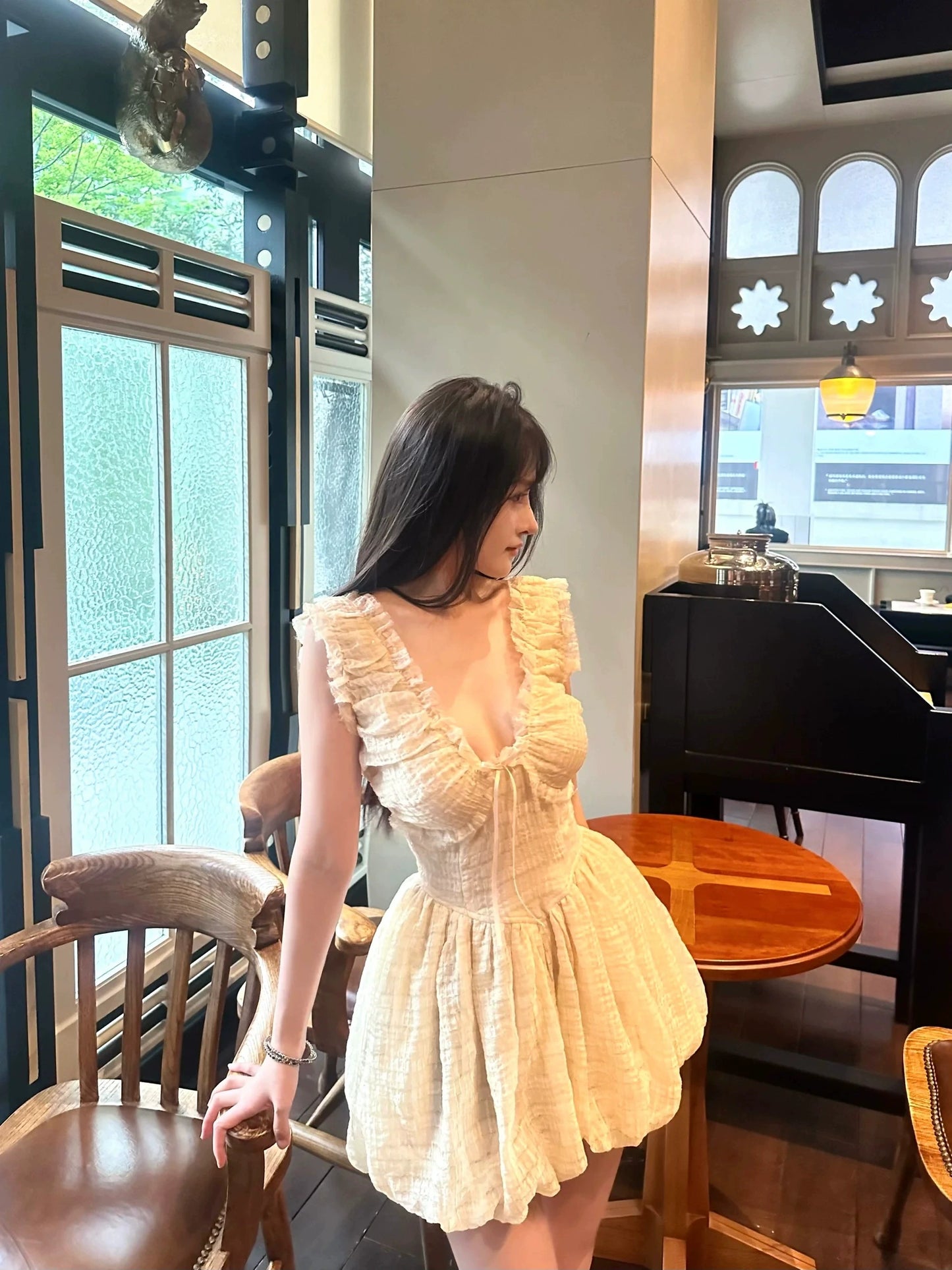 Retro original temperament fairy feeling elastic knitting deep V beautiful back, bud dress fluffy short skirt female summer new