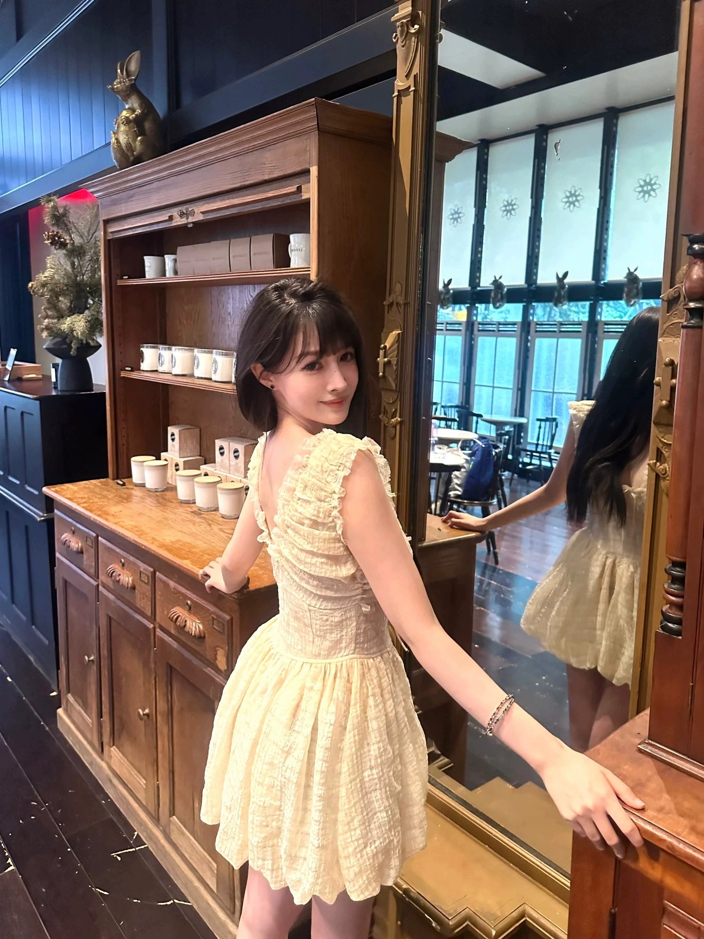 Retro original temperament fairy feeling elastic knitting deep V beautiful back, bud dress fluffy short skirt female summer new