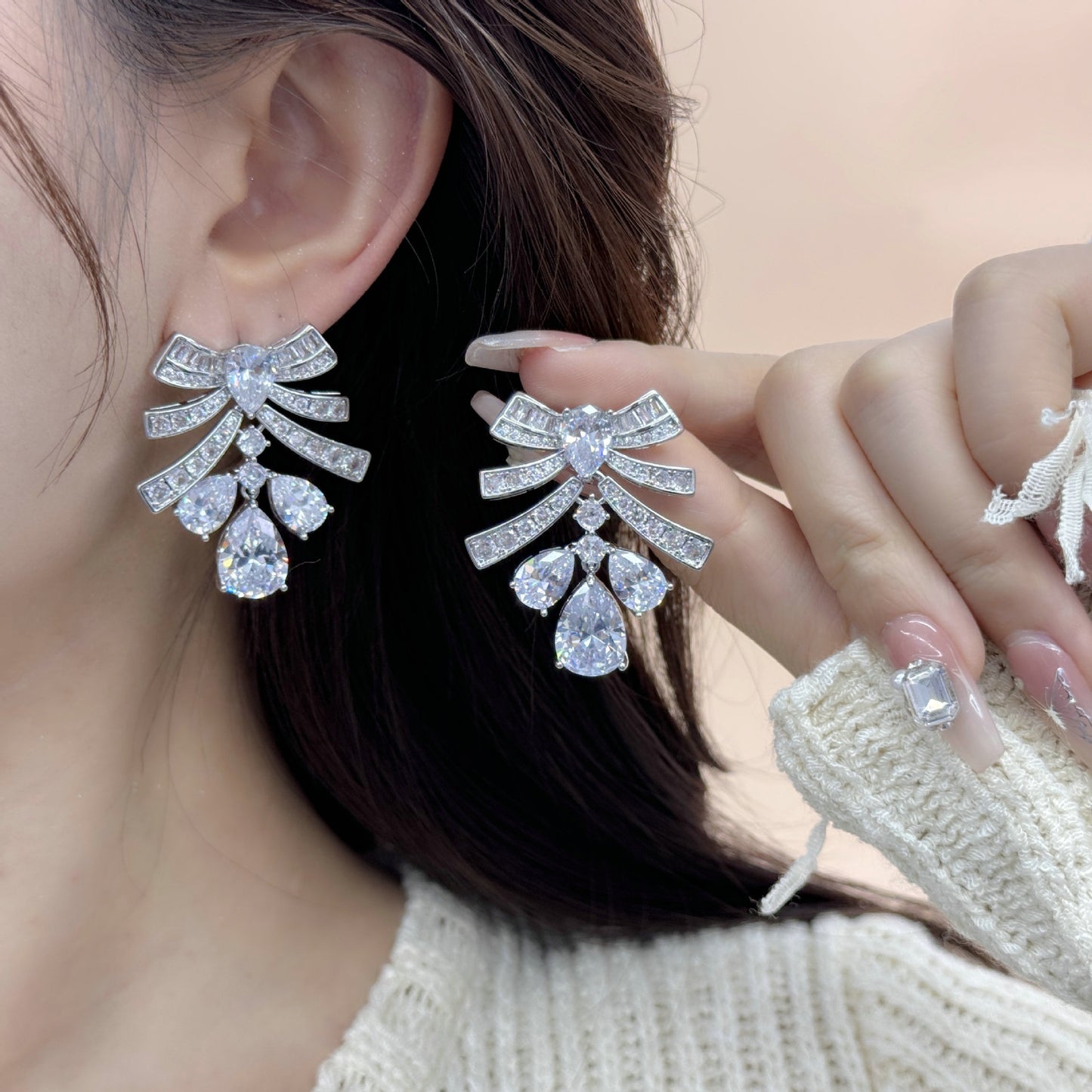 2025 light luxury bow water drop high-end earrings s925 silver needle heavy industry luxury long light luxury earrings