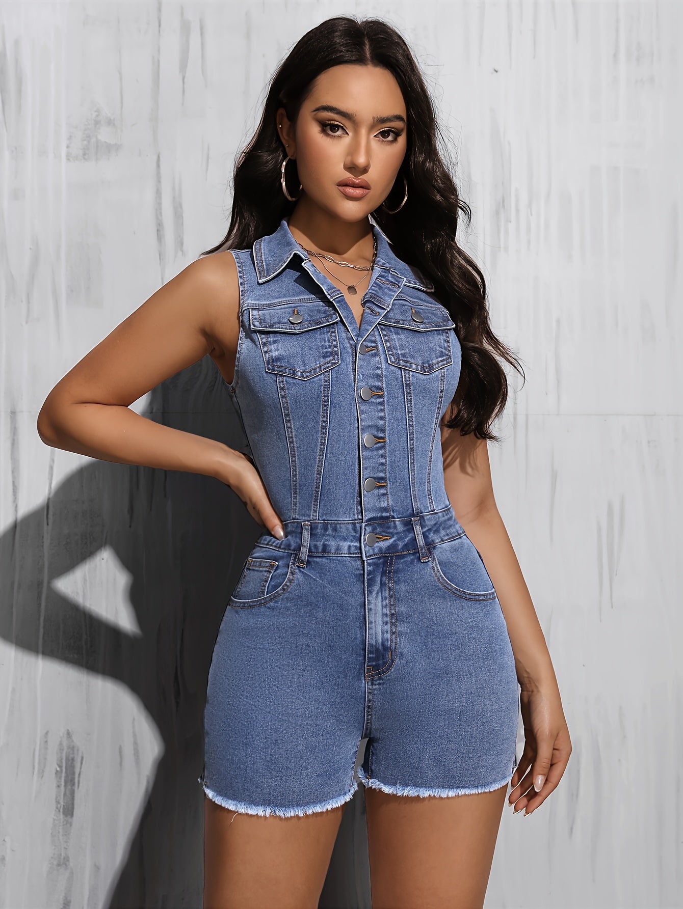 Womens Fashion-Forward Denim Romper - Trendy Frayed Hem, Classic Blue Wash, Sleeveless Button-Down Design - A Chic Summer Jean Playsuit for Versatile Style