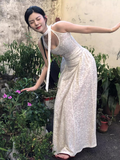 Slightly transparent jacquard dress for women, n Spice Girl sleeveless high-end vacation style hanging neck floral stacking long dress