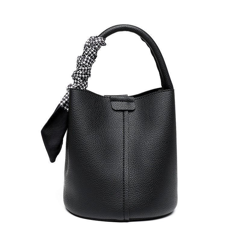 2025 Portable bucket bag, fashionable and simple commuter mother and child bag, winter advanced sense versatile soft leather messenger bag can be one shoulder