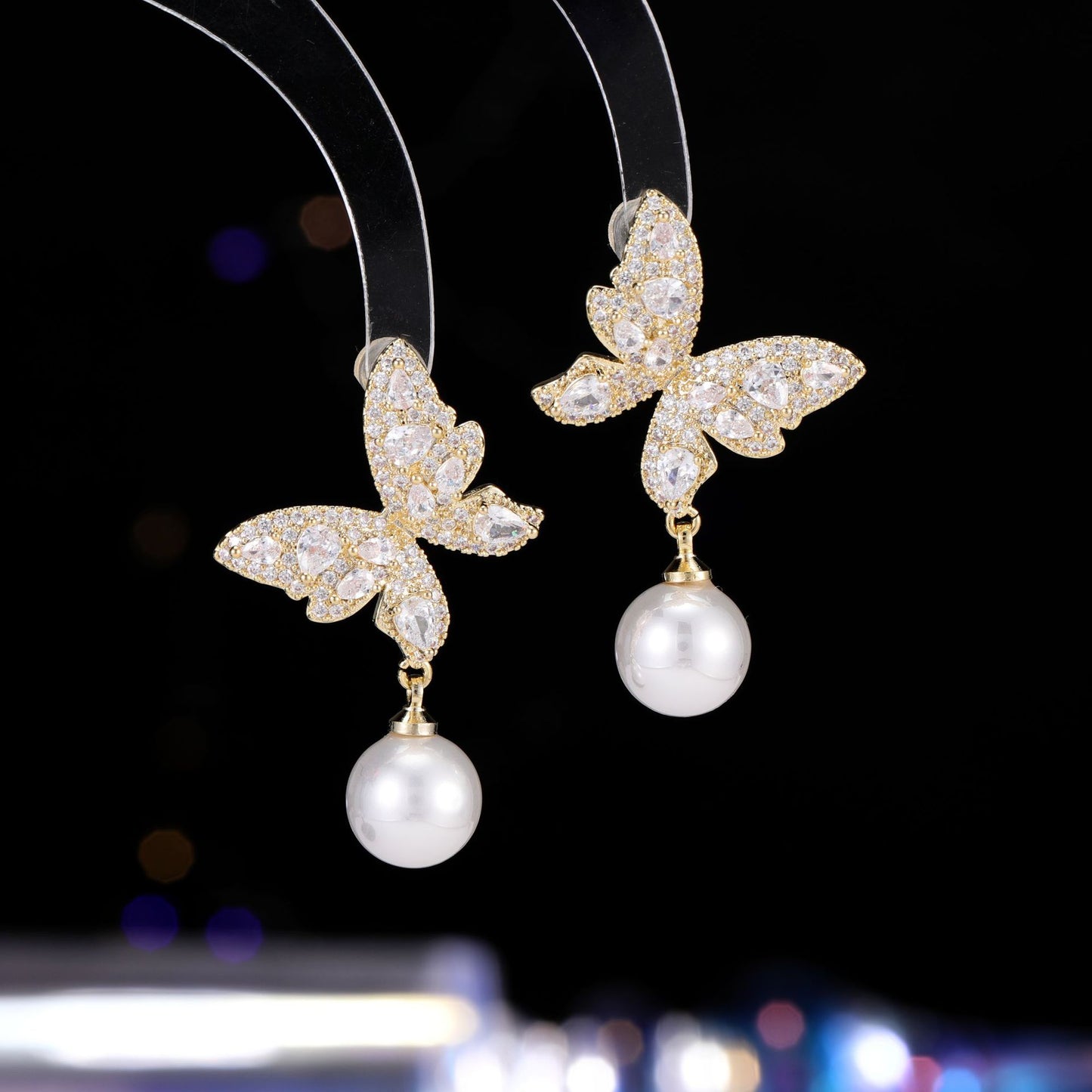 2025 super fairy butterfly pearl earrings women's s925 silver needle light luxury high-end inlaid zircon celebrity sweet earrings