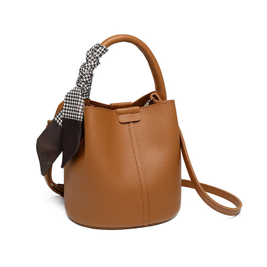 2025 Portable bucket bag, fashionable and simple commuter mother and child bag, winter advanced sense versatile soft leather messenger bag can be one shoulder