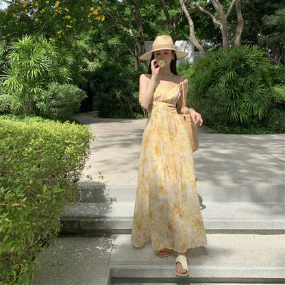 2025 Seaside vacation dress  coffee break niche waist yellow floral suspender beach dress photo pendulum dress