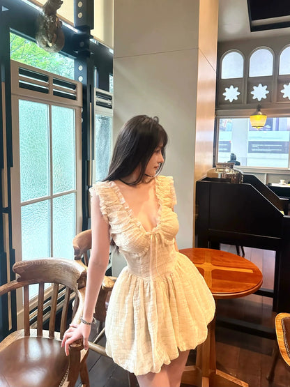 Retro original temperament fairy feeling elastic knitting deep V beautiful back, bud dress fluffy short skirt female summer new