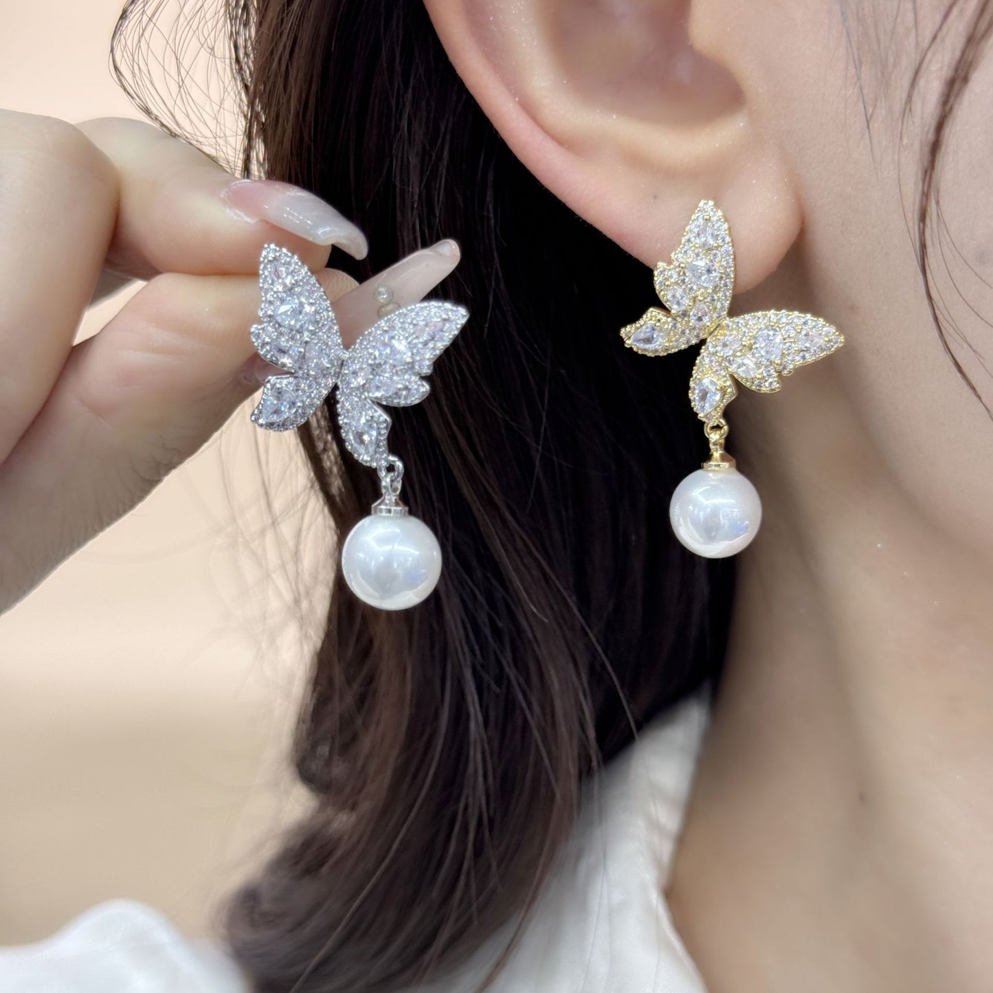 2025 super fairy butterfly pearl earrings women's s925 silver needle light luxury high-end inlaid zircon celebrity sweet earrings