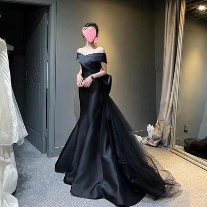 Black evening dress skirt women's 2025 new one-word shoulder high-end dinner light luxury niche fishtail skirt haute couture