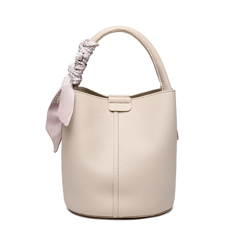2025 Portable bucket bag, fashionable and simple commuter mother and child bag, winter advanced sense versatile soft leather messenger bag can be one shoulder