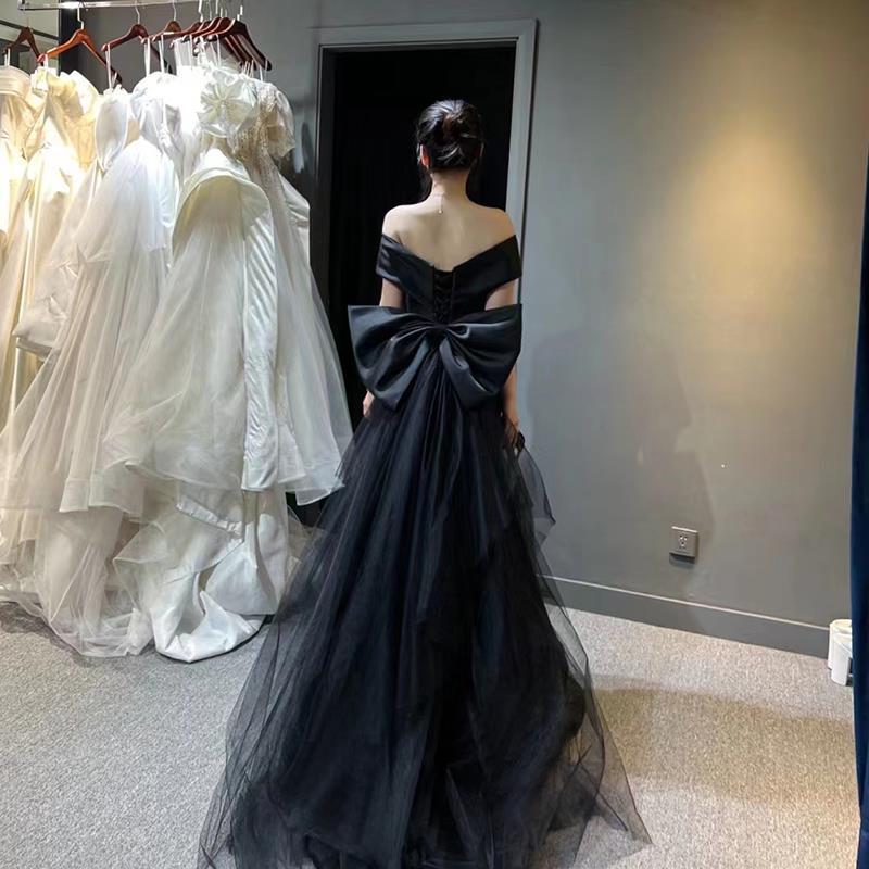Black evening dress skirt women's 2025 new one-word shoulder high-end dinner light luxury niche fishtail skirt haute couture