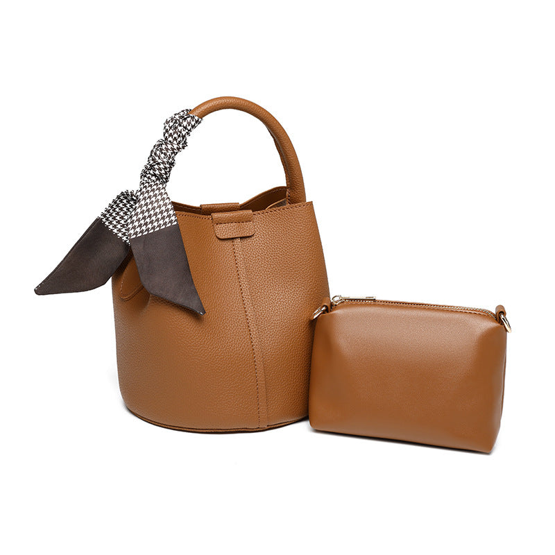 2025 Portable bucket bag, fashionable and simple commuter mother and child bag, winter advanced sense versatile soft leather messenger bag can be one shoulder