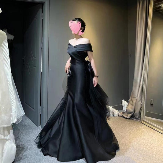 Black evening dress skirt women's 2025 new one-word shoulder high-end dinner light luxury niche fishtail skirt haute couture