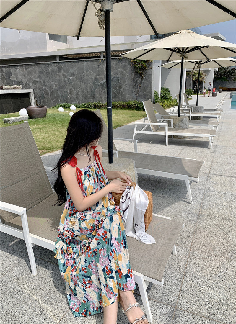 2025 Summer Sanya seaside vacation loose and thin medium and long floral dress women's design sense niche a-word long dress