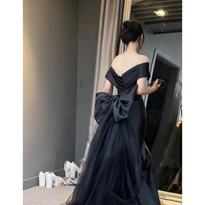 Black evening dress skirt women's 2025 new one-word shoulder high-end dinner light luxury niche fishtail skirt haute couture