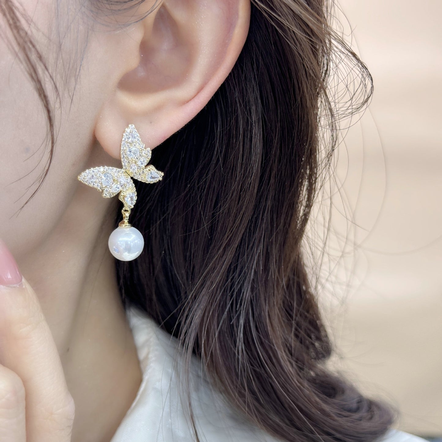 2025 super fairy butterfly pearl earrings women's s925 silver needle light luxury high-end inlaid zircon celebrity sweet earrings