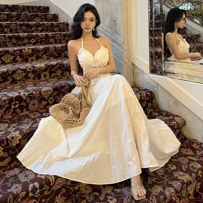 White lace hollowed-out neck sling dress, summer seaside vacation style, unique and beautiful waist A-word long dress
