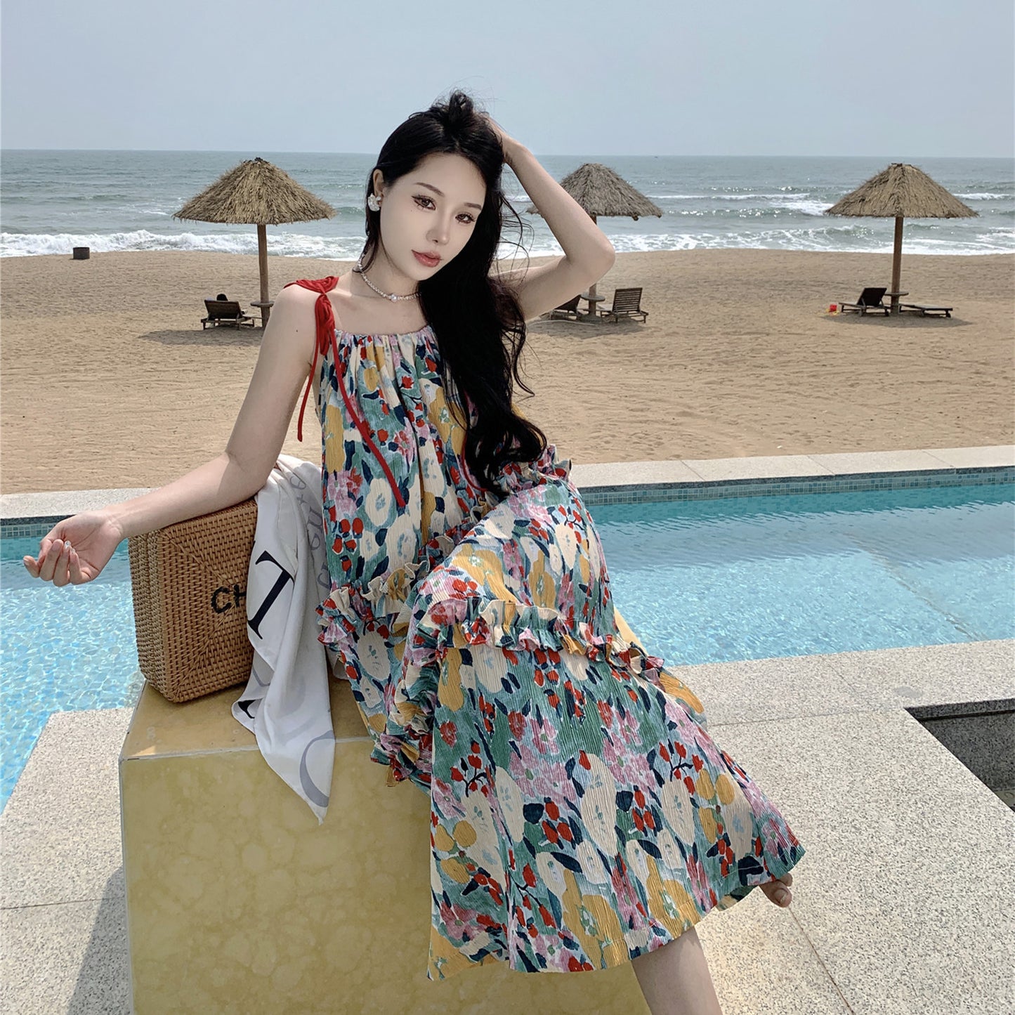 2025 Summer Sanya seaside vacation loose and thin medium and long floral dress women's design sense niche a-word long dress