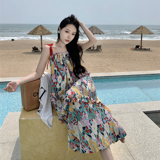 2025 Summer Sanya seaside vacation loose and thin medium and long floral dress women's design sense niche a-word long dress